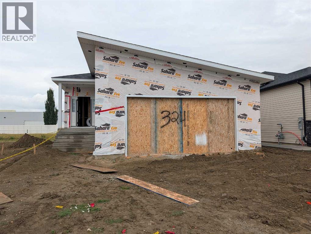 Front exterior of 324 Somerside Road SE under construction